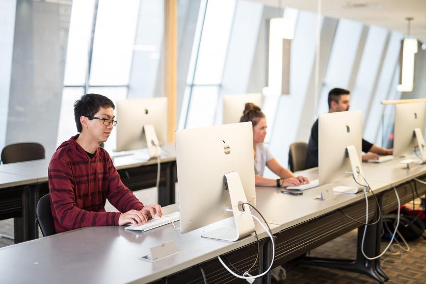 Students work in a computer lab in Hedberg Library.